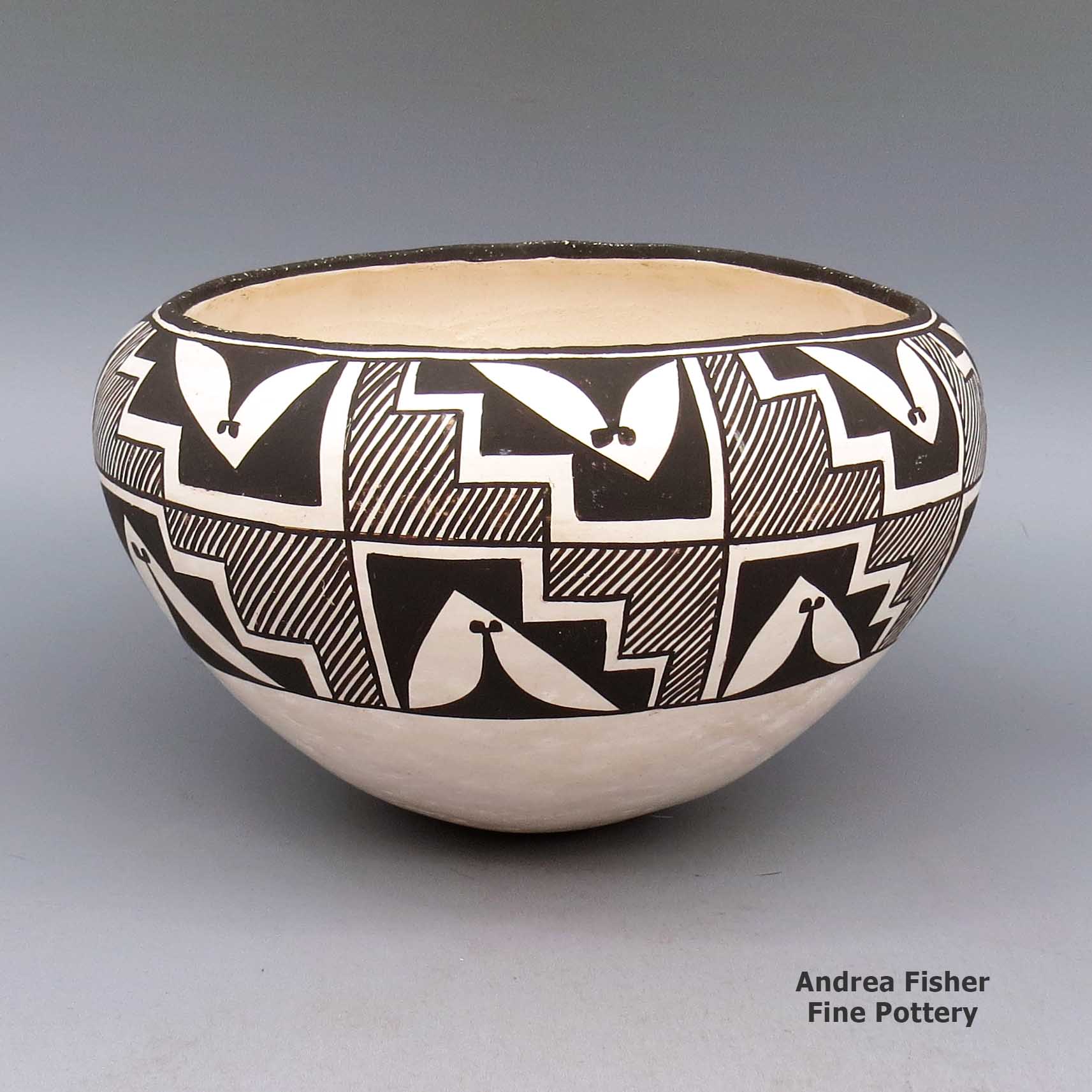 Black and white jar with fine line and geometric design made by Lucy Lewis of Acoma