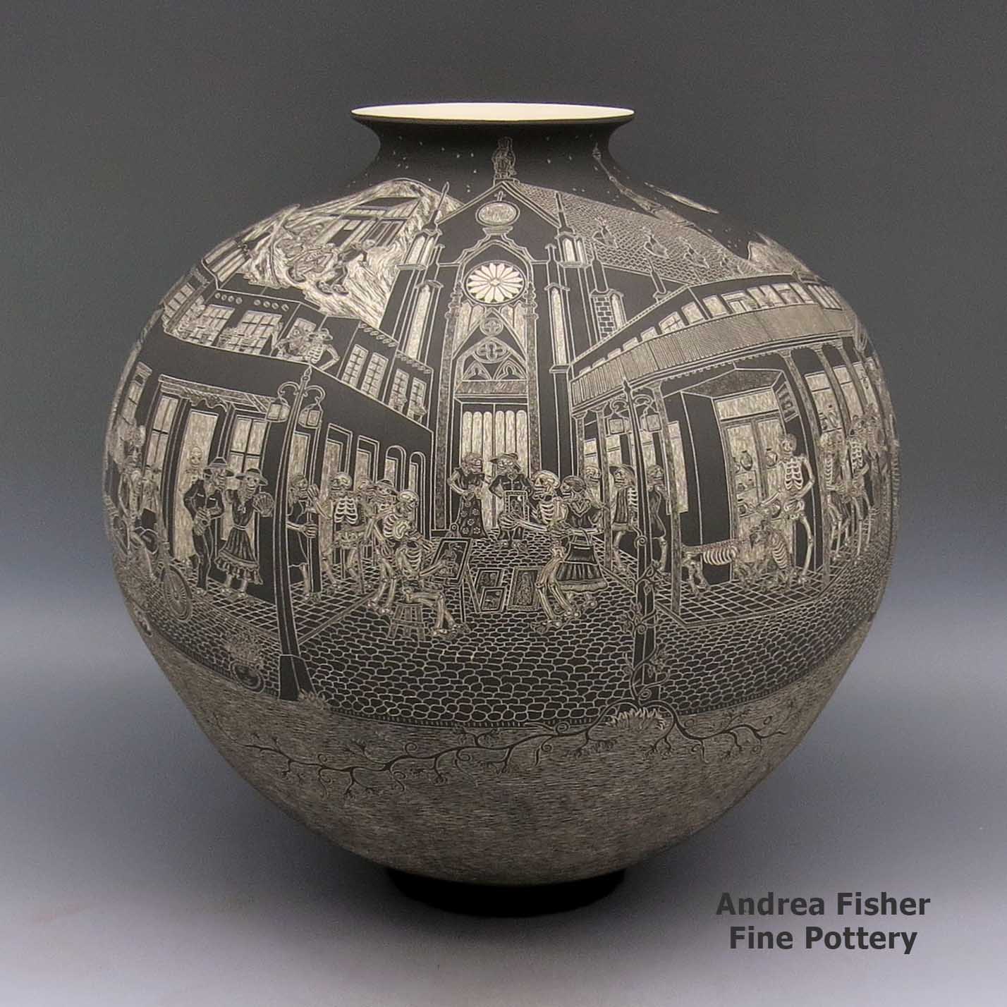Large black and white jar with flared rim and sgraffito Night of the Dead in Santa Fe design made by Hector Javier Martinez of Mata Ortiz and Casas Grandes