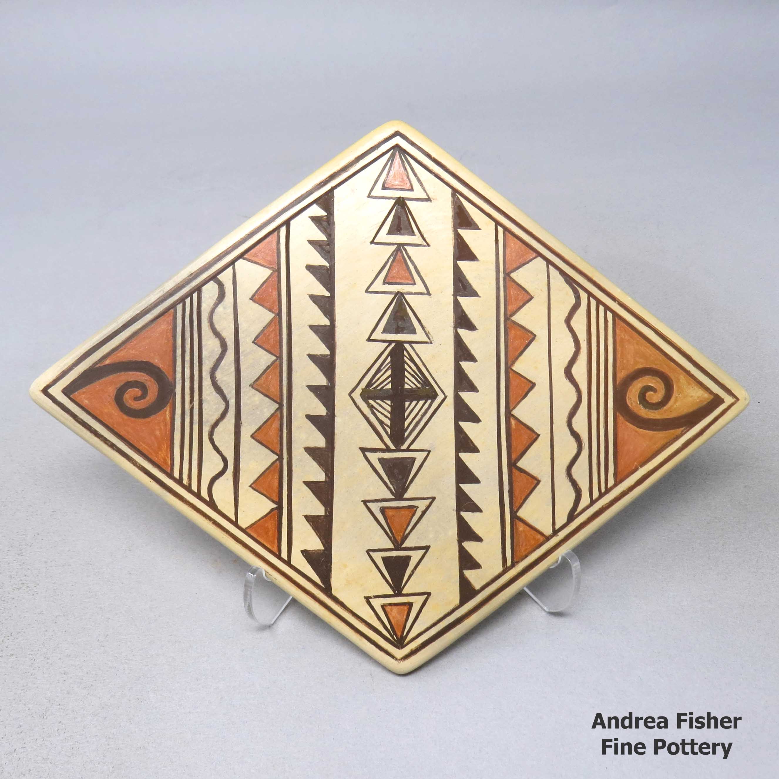 Click or tap to see a larger view Polychrome diamond tile with geometric design
made by Darlene Nampeyo of Hopi