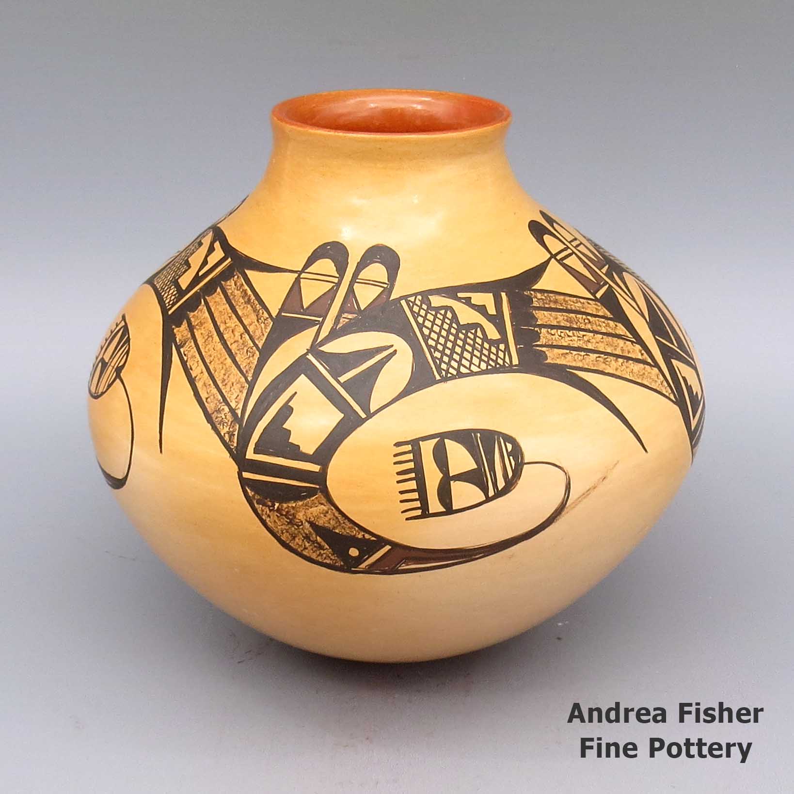 Polychrome jar with geometric design and fire clouds made by White Swann of Hopi