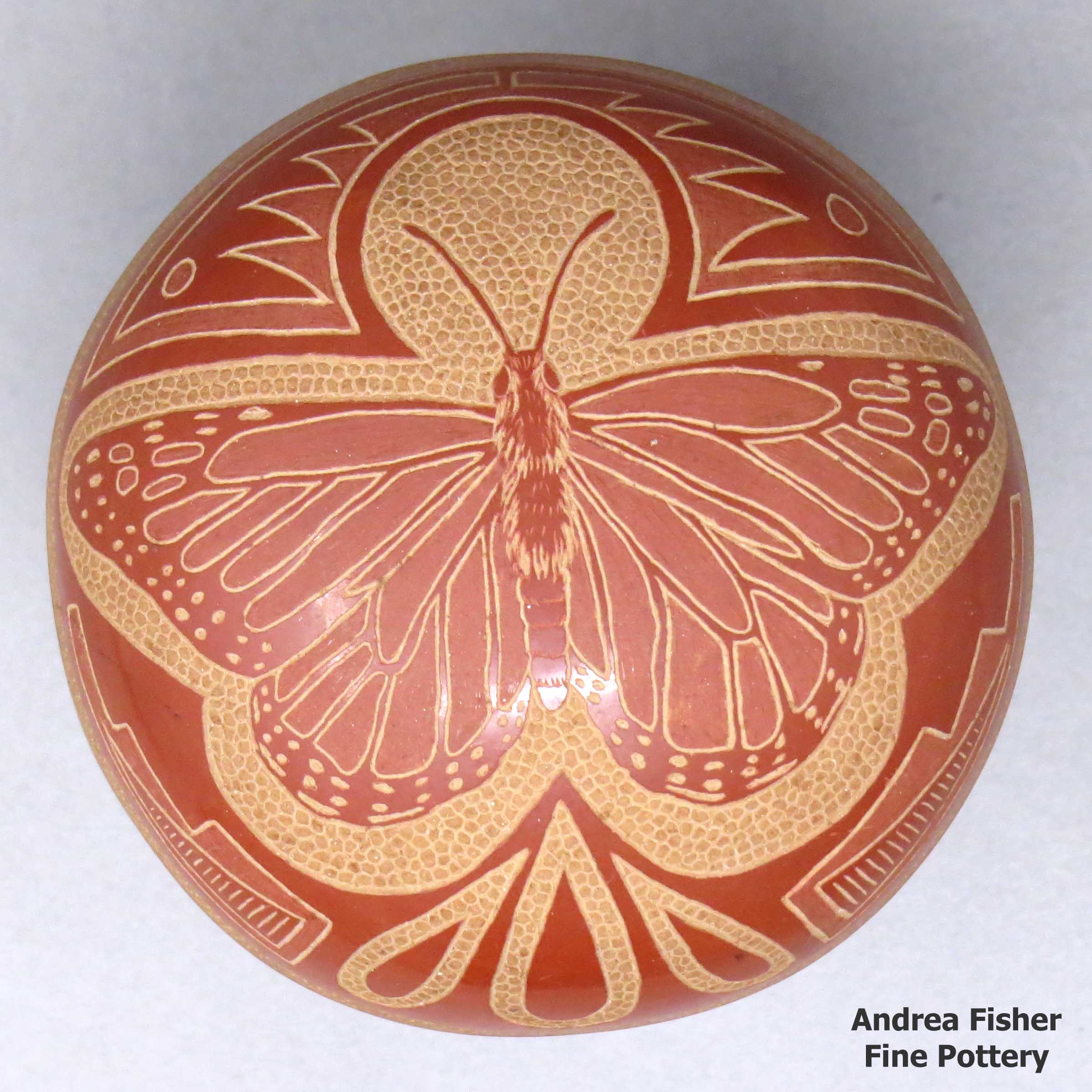 Rosemary Lonewolf created this piece, Click or tap to see a larger version Miniaturepolychromeseedpotwithsgraffitobutterfly,scrollandgeometricdesign
, Click or tap to see a larger version