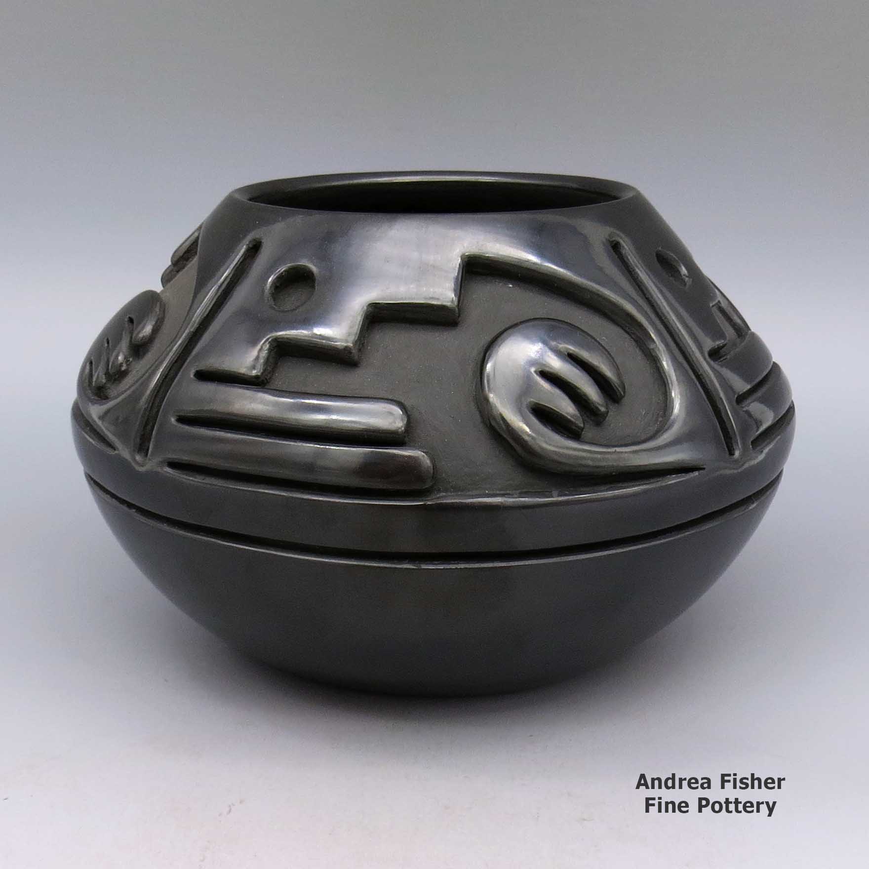 Black bowl carved with a geometric design made by Teresita Naranjo of Santa Clara