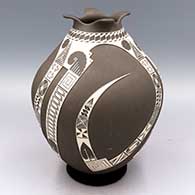 Gray jar with organic 4 pointed rim with off-white geometric design
 by Roberto Olivas of Mata Ortiz and Casas Grandes
