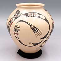 Polychrome jar with a rolled lip and a 3-panel geometric design
 by Lila Silveira of Mata Ortiz and Casas Grandes