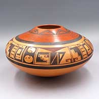 Polychrome jar with a slightly raised rim and a 4-panel geometric design above the shoulder
 by Eunice Navasie of Hopi