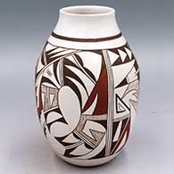 Polychrome jar with a 4-panel bird element and geometric design
 by Joy Navasie aka 2nd Frogwoman of Hopi