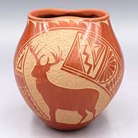 Red jar with an organic opening and a sgraffito stag, butterfly-on-a-bush and geometric design
 by Carol Vigil of Jemez