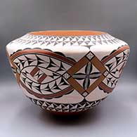 Large polychrome jar with a 4-panel geometric design around the body
 by Marquis Lente of Laguna