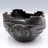 Black prayer bowl with a squared rim and carved with a 4-panel katsina and geometric design
 by Reycita Cosen of Santa Clara