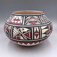 Polychrome jar with bands of geometric design around the body
 by Joseph Latoma of San Felipe