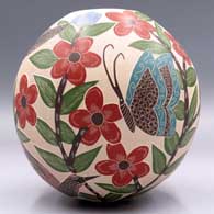 Polychrome jar with a sgraffito and painted bird, butterfly, flower, branch and leaf design
 by Blanca Arras of Mata Ortiz and Casas Grandes
