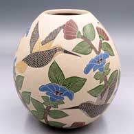 Polychrome jar with a sgraffito and painted bird, butterfly, branch and leaf design
 by Karla Flores of Mata Ortiz and Casas Grandes