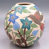 Polychrome jar with a sgraffito and painted hummingbird, butterfly, flower, leaf and branch design
 by Blanca Arras of Mata Ortiz and Casas Grandes