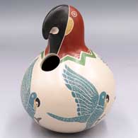Polychrome parrot effigy  jar with a sgraffito and painted 4-panel parrot design
 by Vidal Corona of Mata Ortiz and Casas Grandes
