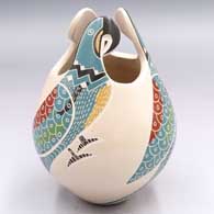 Polychrome jar with a 3-panel carved, sgraffito and painted bird element design
 by Vidal Corona of Mata Ortiz and Casas Grandes