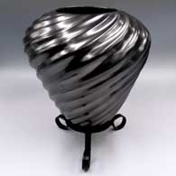 Black melon jar with spiral repousse ribs
 by Antonio Sandoval of Mata Ortiz and Casas Grandes