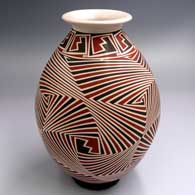 Polychrome jar with a rolled lip and a geometric design
 by Rodrigo Perez of Mata Ortiz and Casas Grandes