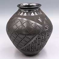 Black-on-black jar with a flared lip and a 3-panel geometric and cuadrillo design
 by Ismael Sandoval of Mata Ortiz and Casas Grandes