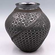 Black-on-black jar with a flared rim, bands of corrugation and a painted cuadrillo geometric design
 by Ismael Sandoval of Mata Ortiz and Casas Grandes