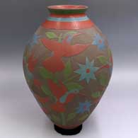 Polychrome jar with a sgraffito and painted hummingbird,branch, flower and geometric design
 by Jesus Olivas of Mata Ortiz and Casas Grandes