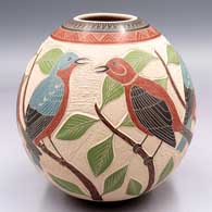 Polychrome jar with a sgraffito and painted 3-panel bird, branch, leaf and geometric design
 by Jesus Olivas of Mata Ortiz and Casas Grandes