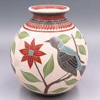 Polychrome jar with a rolled lip and a 3-panel sgraffito and painted bird, flower, vine, leaf and geometric design
 by Jesus Olivas of Mata Ortiz and Casas Grandes