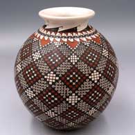 Polychrome jar with a rolled lip and a cuadrillos and geometric design
 by Alma Flores of Mata Ortiz and Casas Grandes