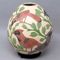 Polychrome jar with sgraffito and painted bird and branch design
 by Linda Betancourt of Mata Ortiz and Casas Grandes
