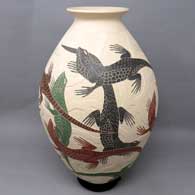Polychrome jar with sgraffito and painted iguana and geometric design
 by Humberto Guillen Rodriguez of Mata Ortiz and Casas Grandes