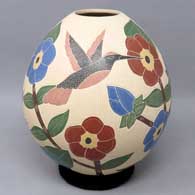 Polychrome jar with sgraffito and painted bird, branch and flower design
 by Karla Flores of Mata Ortiz and Casas Grandes
