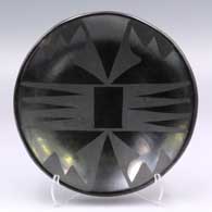 Black-on-black plate with a geometric design
 by Maria Martinez of San Ildefonso