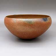 Large micaceous gold bowl with fire clouds
 by Lonnie Vigil of Nambe