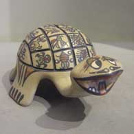 Polychrome turtle with animal and geometric design 
 by Margaret and Luther Gutierrez of Santa Clara