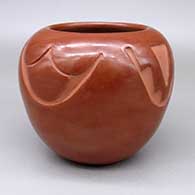 Red jar with a carved raincloud and kiva step geometric design
 by Rose Gonzales of San Ildefonso