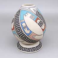 Polychrome jar with a geometric design and a matching stand
 by Yolanda Soto of Mata Ortiz and Casas Grandes