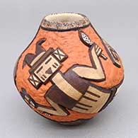 Small polychrome jar with a carved-and-painted male yeibichai and geometric design
 by Carla Nampeyo of Hopi