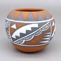 Polychrome bowl with a four panel geometric design
 by Mary Small of Jemez