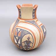 Polychrome jar with a pie crust rim and a carved-and-painted four-panel cornstalk and geometric design
 by Bertha Gachupin of Jemez
