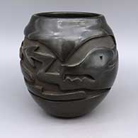 Black jar with carved avanyu design
 by Mida Tafoya of Santa Clara