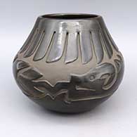 Black jar with carved avanyu and feather ring design
 by Sharon Naranjo Garcia of Santa Clara