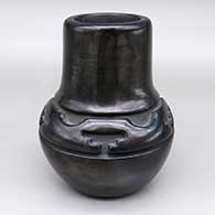 Black jar with a carved geometric design
 by Mary Ester Archuleta of Santa Clara