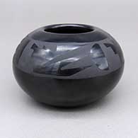 Small black-on-black jar with a geometric design
 by Pauline Martinez of San Ildefonso
