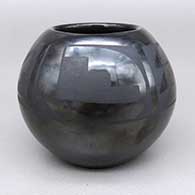 Small black-on-black jar with a geometric design
 by Margaret Lou Gutierrez of San Ildefonso