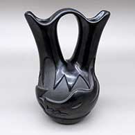 Black wedding vase with a carved avanyu design
 by Madeline Naranjo of Santa Clara