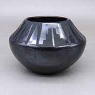 Black-on-black jar with a kiva step and geometric design
 by Maria Martinez of San Ildefonso