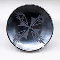 Black-on-black plate with a geometric design
 by Santana Martinez of San Ildefonso
