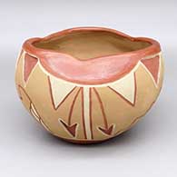 Polychrome jar with an organic opening and a lightly carved and painted raincloud and geometric design
 by Tomasita Reyes Montoya of Ohkay Owingeh