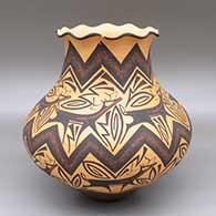 Polychrome jar with a fluted rim and a deer with heart line and geometric design
 by Anderson Peynetsa of Zuni