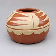 Small red jar with a four-panel painted geometric design
 by Albert Vigil of San Ildefonso