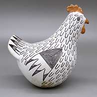 Polychromechickenfigurewithafinelinegeometricdesign, click or tap to see a larger version